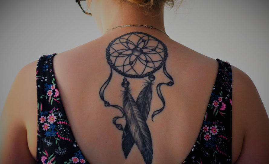 Woman with Tattoo on her Back Woman with Tattoo on her Back